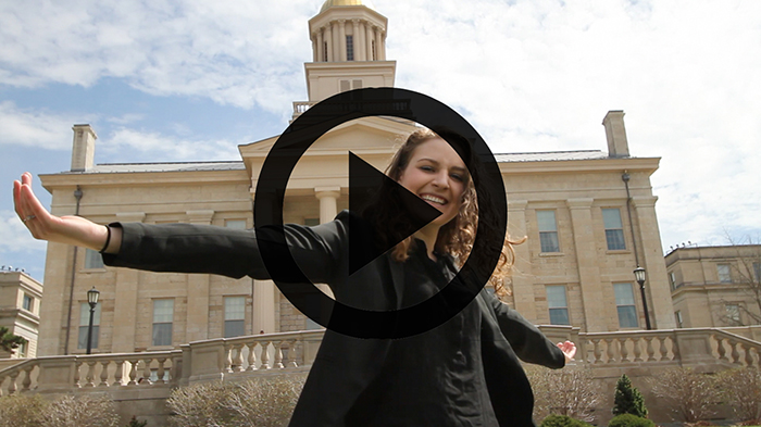 Video still of female student in front of Old Capitol