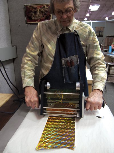 Virginia Myers working with the Iowa Foil Press