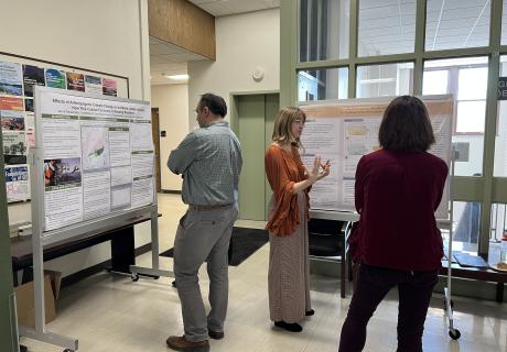 A photo of seniors presenting their research project posters at this year's session in Jessup Hall