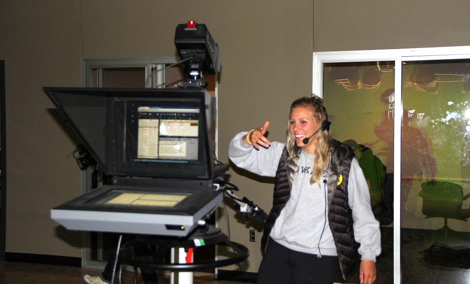 A student working behind the camera