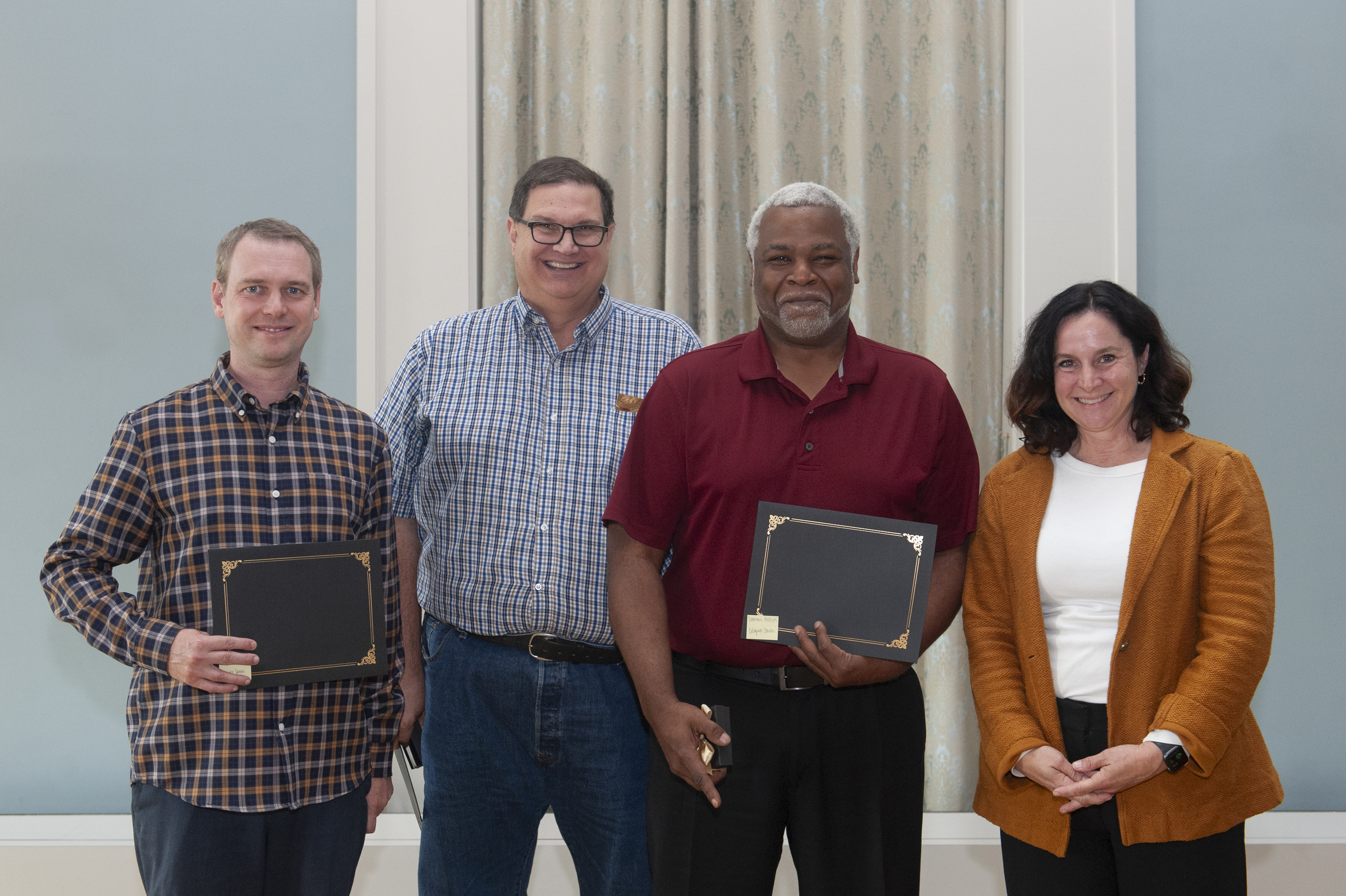 A photo of Ryan Kinser, Matthew Hill, Damani Phillips and Sara Sanders