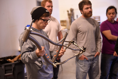 A student builds a bike as part of a 3D design course
