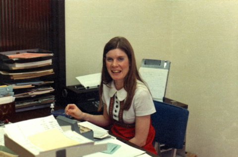 Driscol at her desk