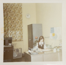 Driscol working at her desk in the 1960s.