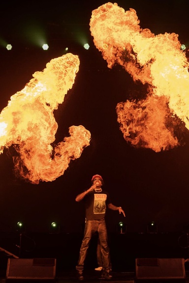 Image: Gunna performs on stage with pyrotechnics