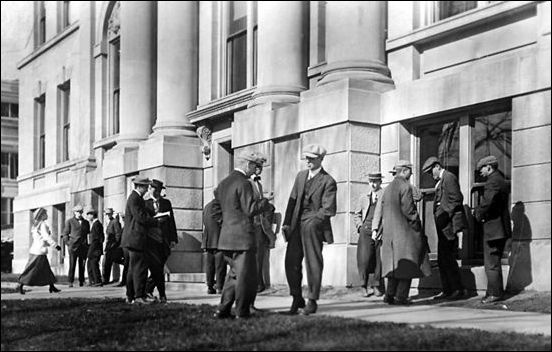 Men and women standing outside of Schaeffer Hall