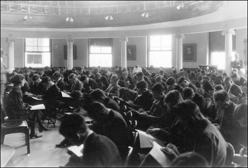 Students sitting during a lecture in the auditorium of Schaeffer Hall