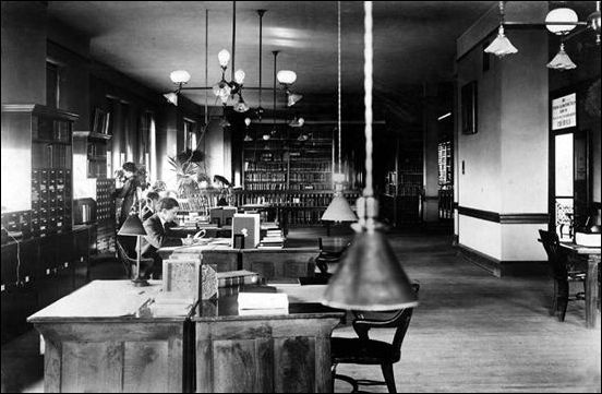 Inside of Schaeffer Hall with men working at desks