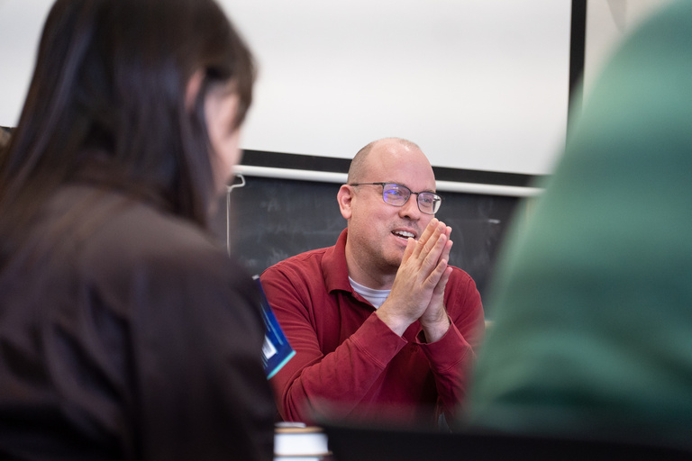 Paul Dilley in discussion with students in class