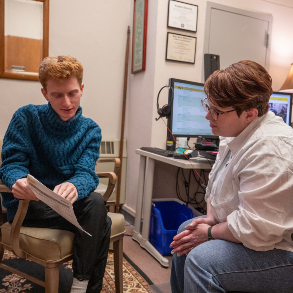 A student meets with their advisor