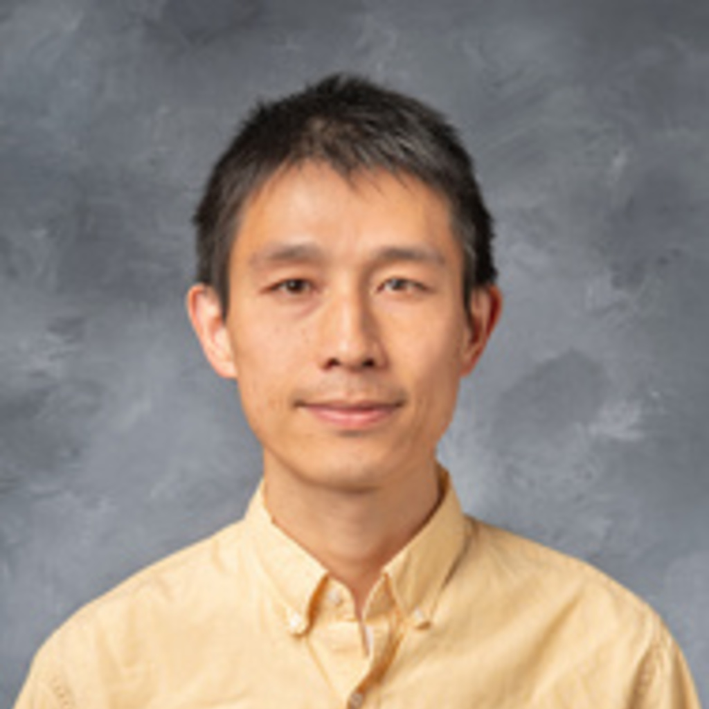 A photo headshot of Bin Z. He 