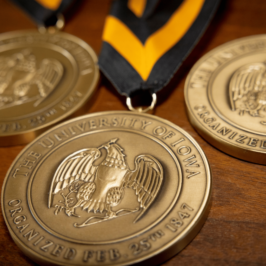 A medallion with the University of Iowa seal