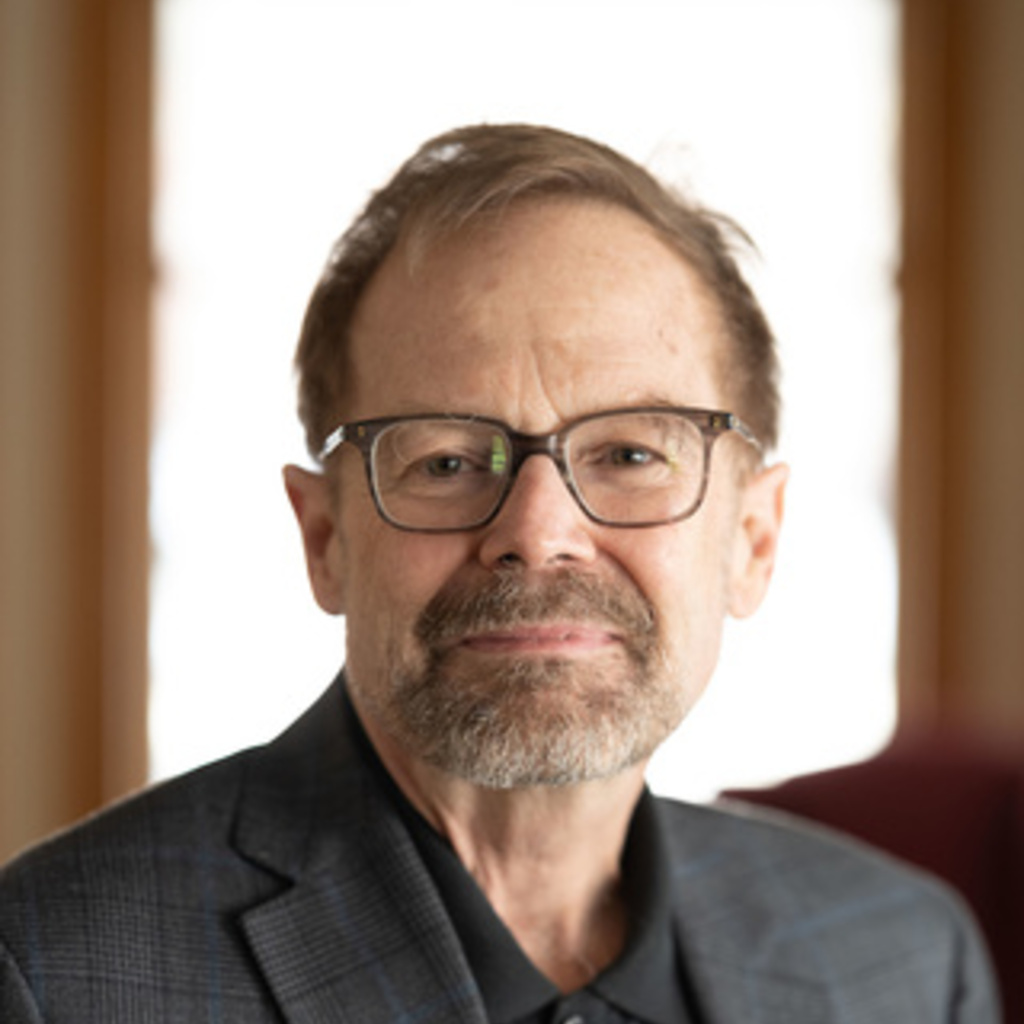 A headshot of Christopher Merrill, the former director of the International Writing Program at the University of Iowa.