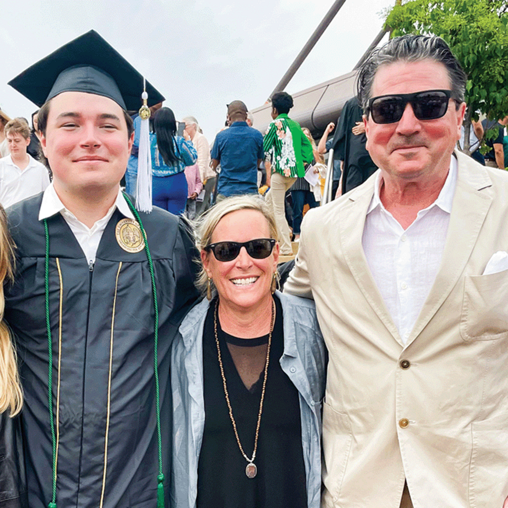 Alumni Nickolas Rhodes and Penny Rhodes celebrate their son's graduation from the University of Iowa.