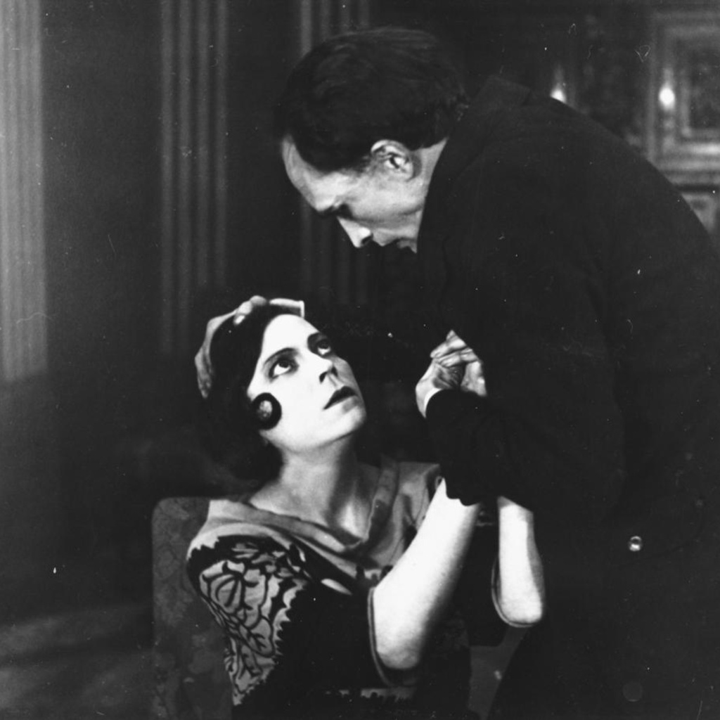 Still from a black and white silent film Der Reigen