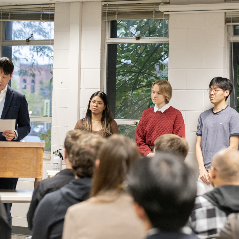 Students with the IWP writer they translated for