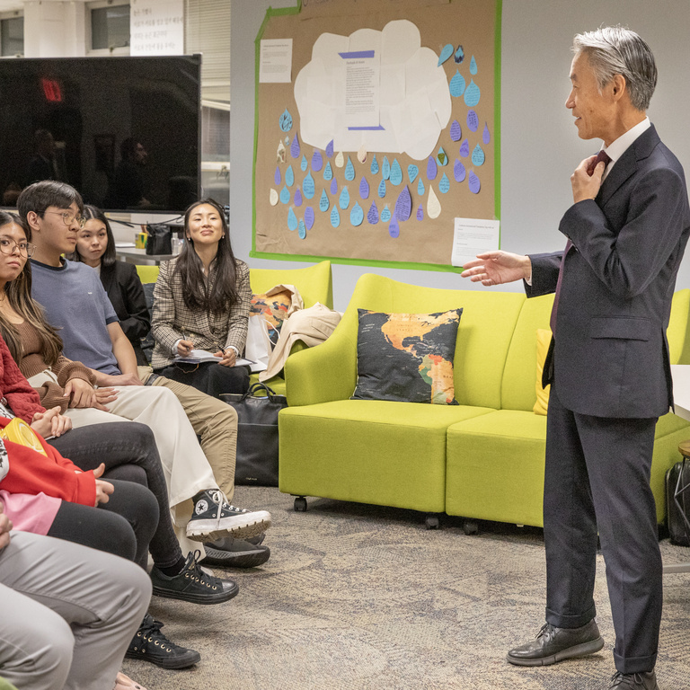 The Japanese Ambassador speaking to students