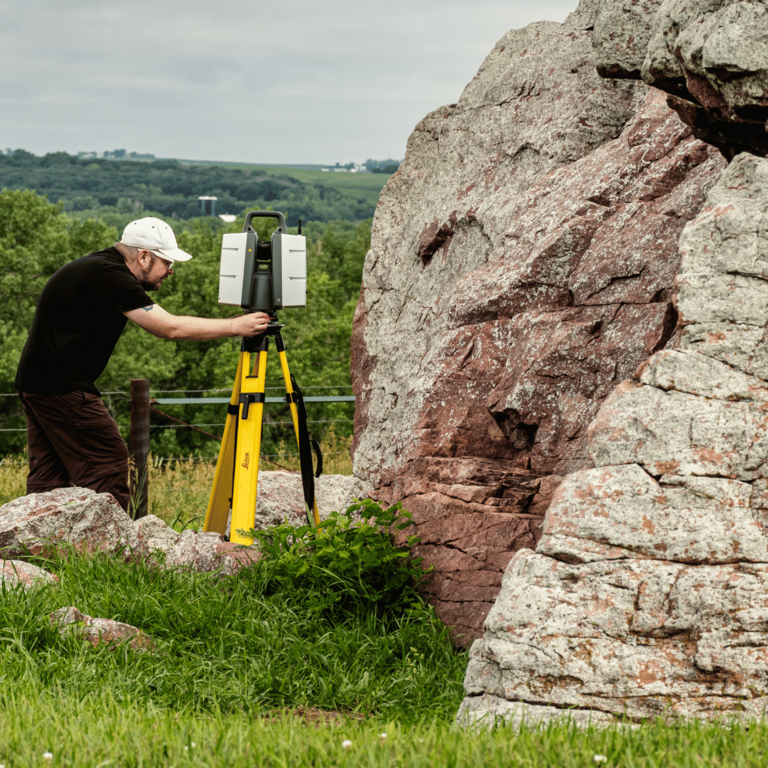 Skibbe positions a scanning device close to Pilot Rock 