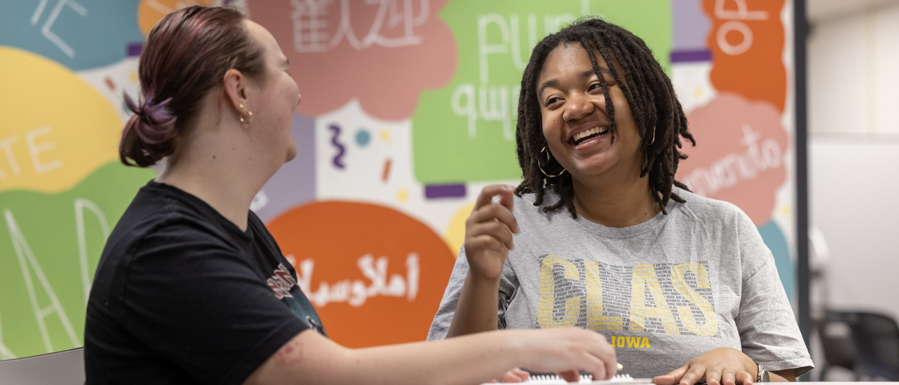 student tutoring another student in Phillips Hall