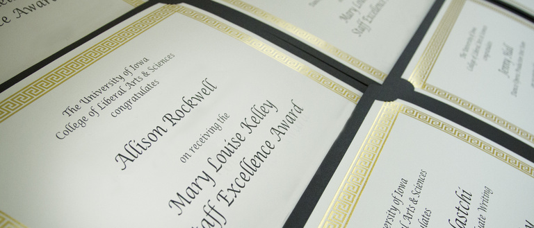 close-up of staff excellence award