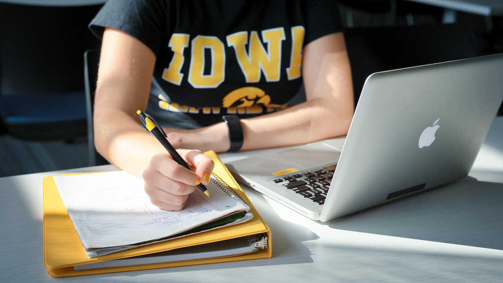 A student studying at Iowa