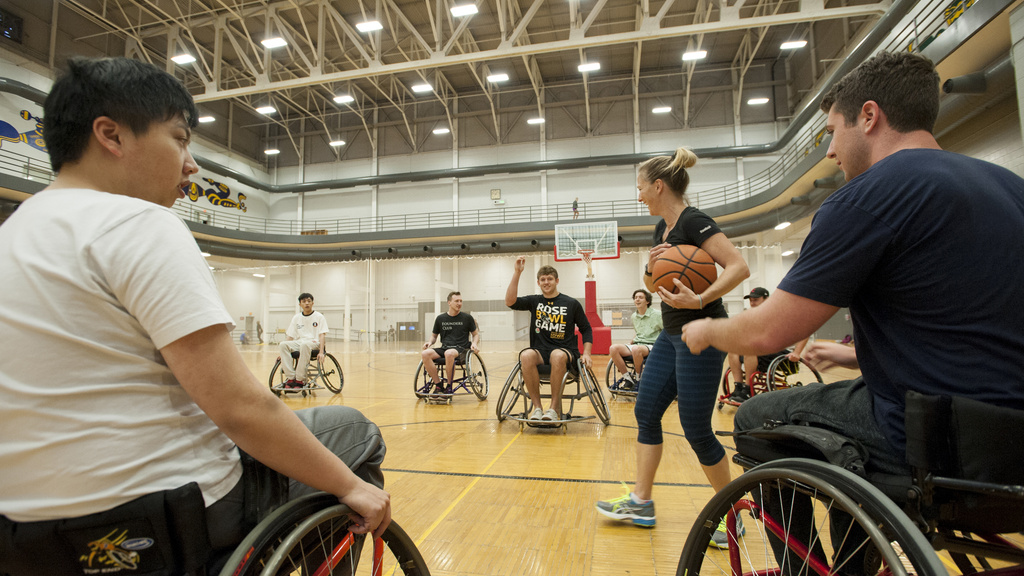 students at hoop fest in wheelchairs playing basketball