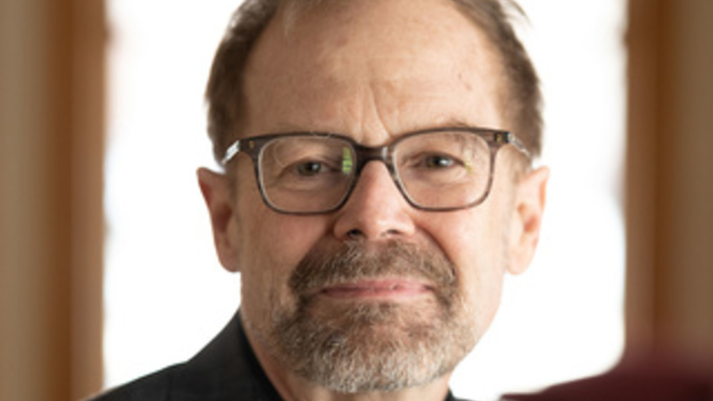 A headshot of Christopher Merrill, the former director of the International Writing Program at the University of Iowa.