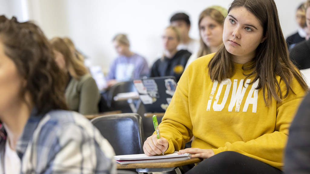 student in criminology class wearing Iowa sweatshirt