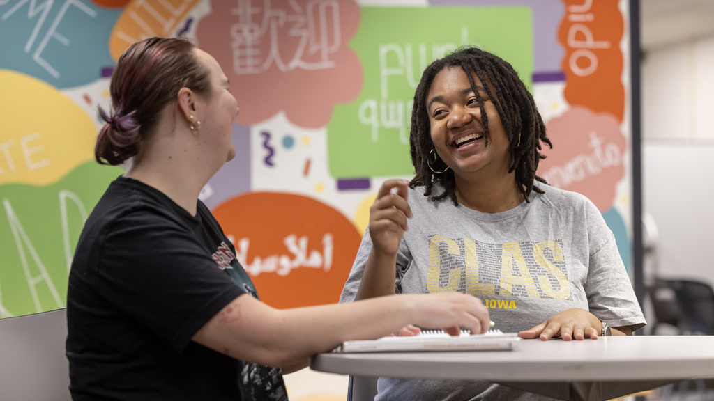 student tutoring another student in Phillips Hall