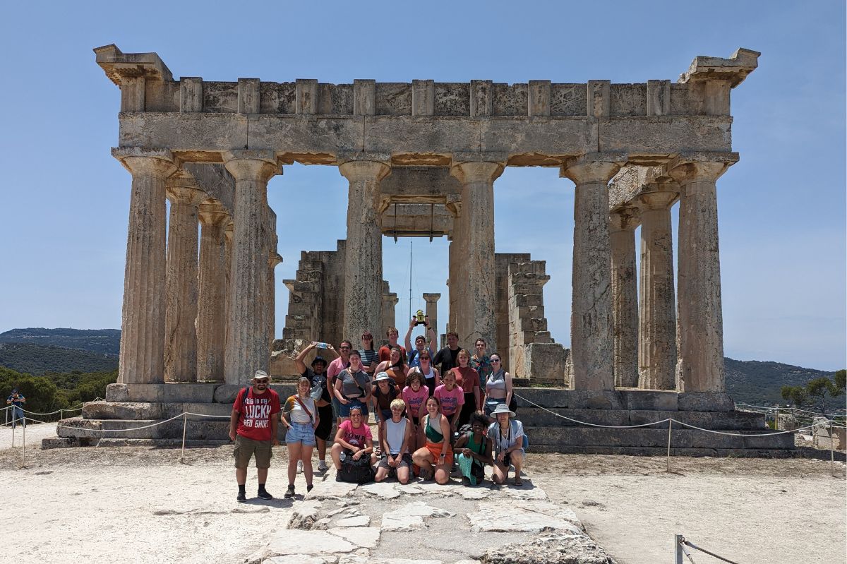 Study abroad group in front of the Temple of Aphaia on the island of Aegina in Greece.