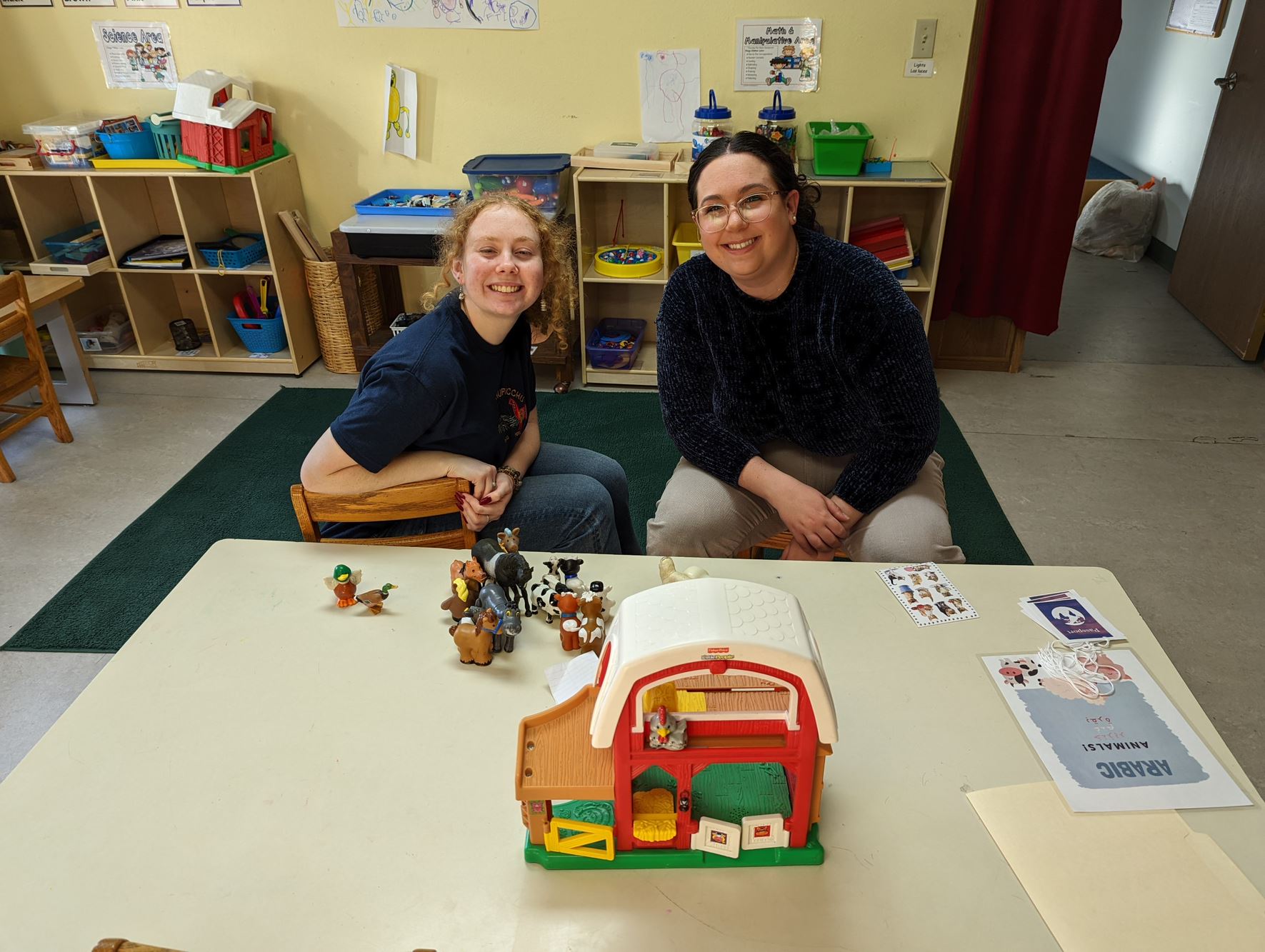 Emily Hartman (right) works at Neighborhood Centers of Johnson County