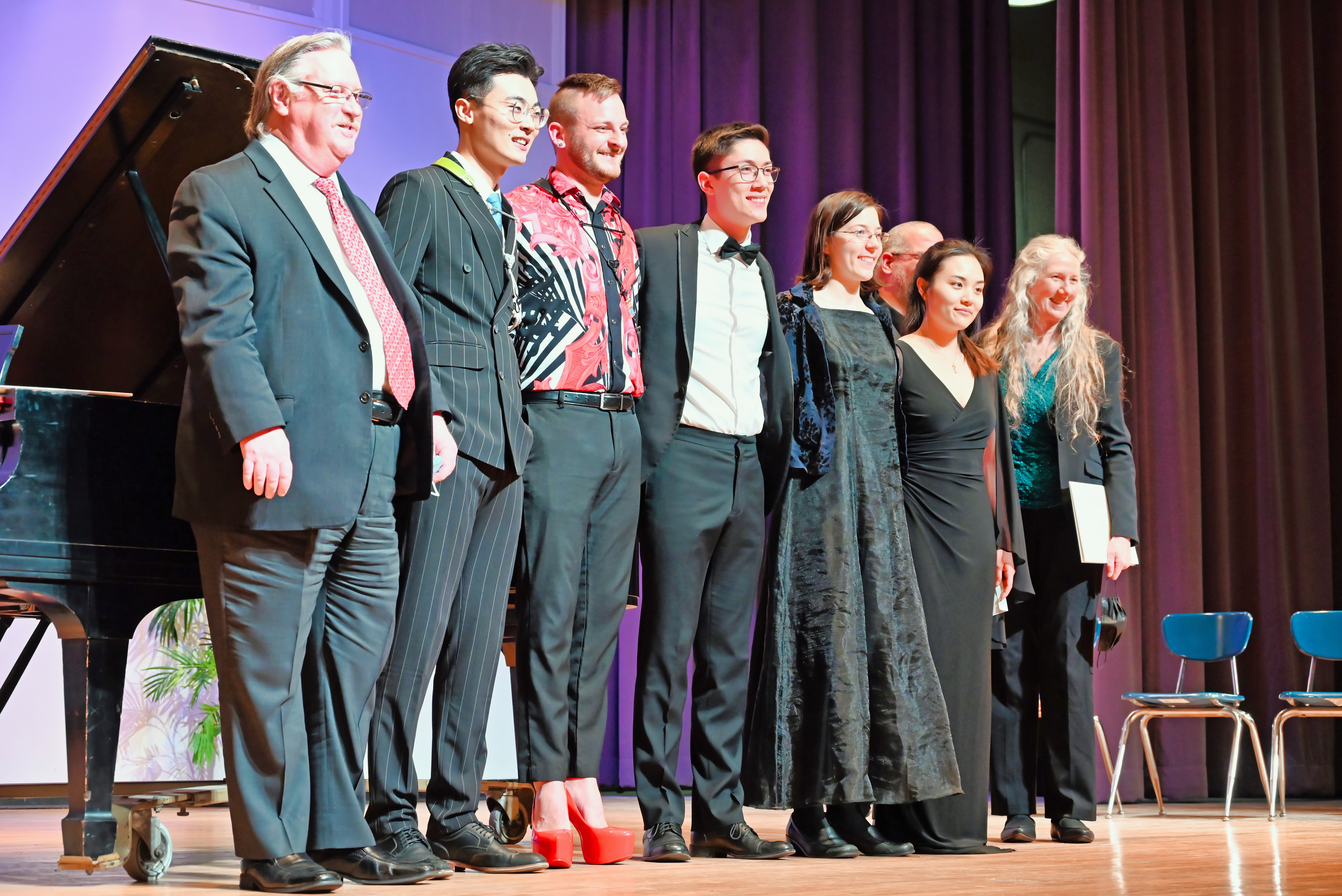 A photograph of finalists on stage at the music competition