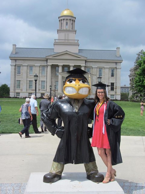 Sarah Mayer with Herky graduation statue