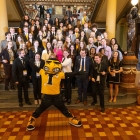 Students pose with Herky after participating in Hawkeye Caucus Day
