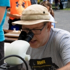 A participate uses a microscope during the third annual BioBlitz