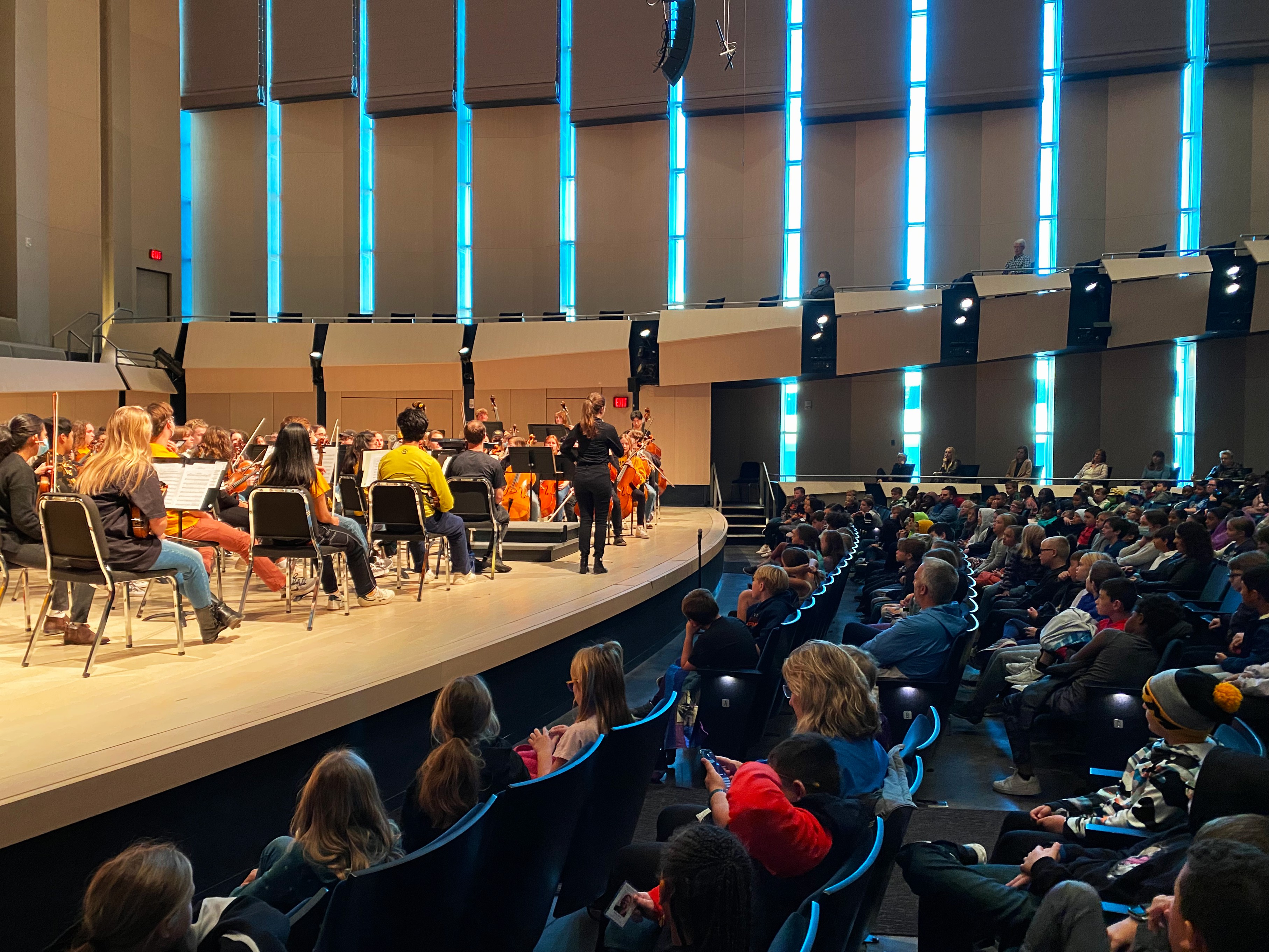 4th grade students from Iowa City Schools enjoying an orchestra performance.